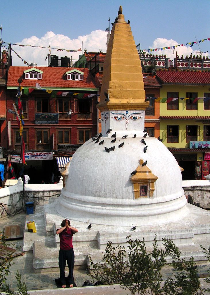 Brano prostrating in front of Boudhanath Stupa in Nepal
