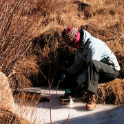 Mongolia - Paula filtering river water for drinking