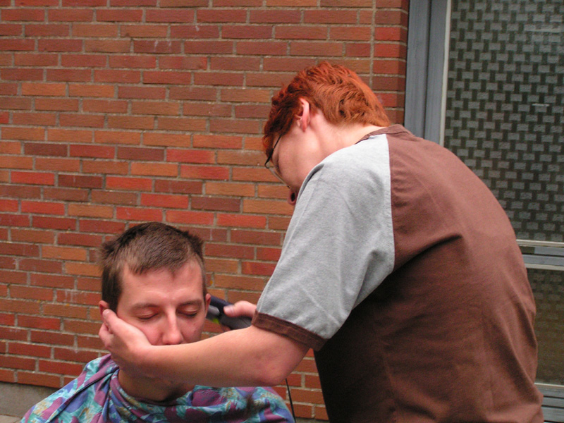 Andrea making Tom a nice hair cut