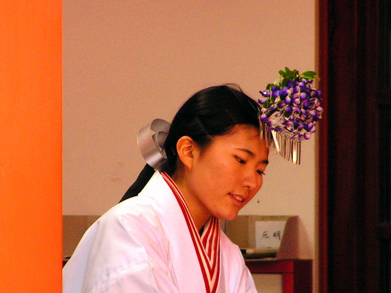 Japan - Nara - a saleswoman in Kasuga Grand Shrine