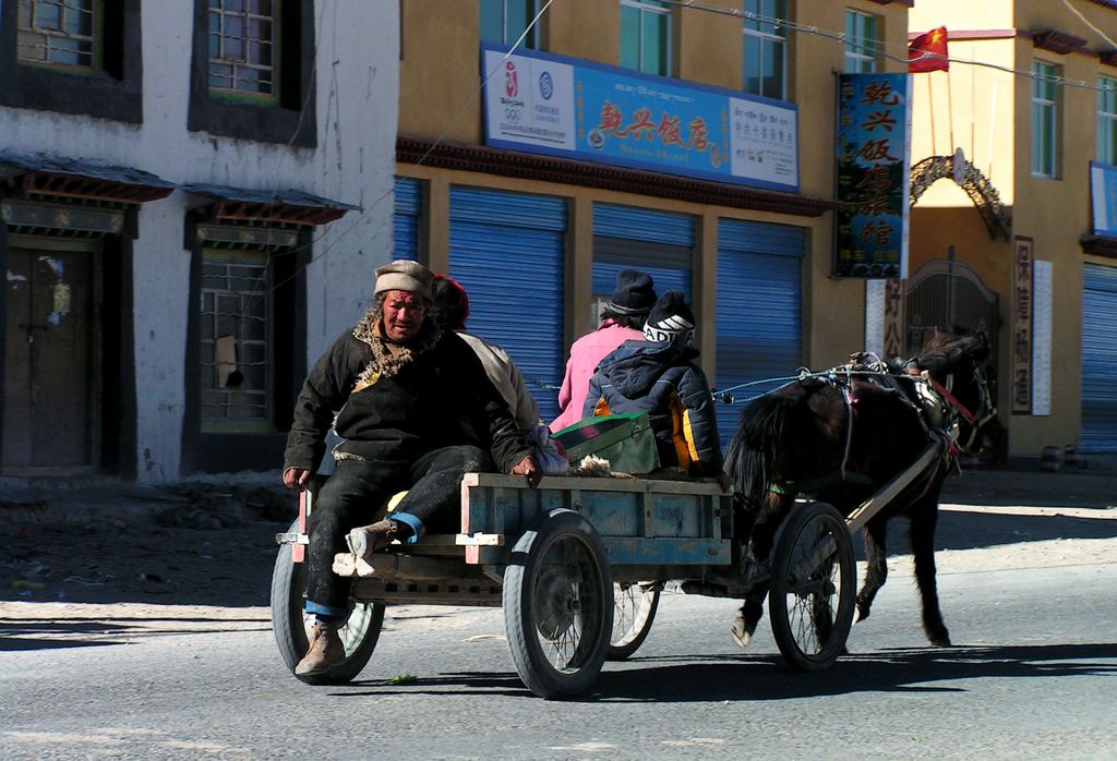 Tibet - local people traveling in Tingri