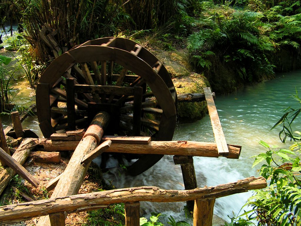 Laos - an old water mill in the Kouang Si waterfall