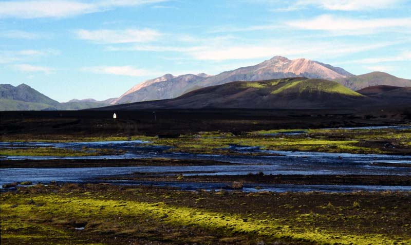 Iceland - a road behind the river