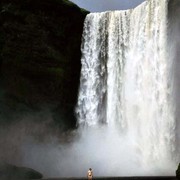 Iceland - a shower in Skogarfoss waterfall