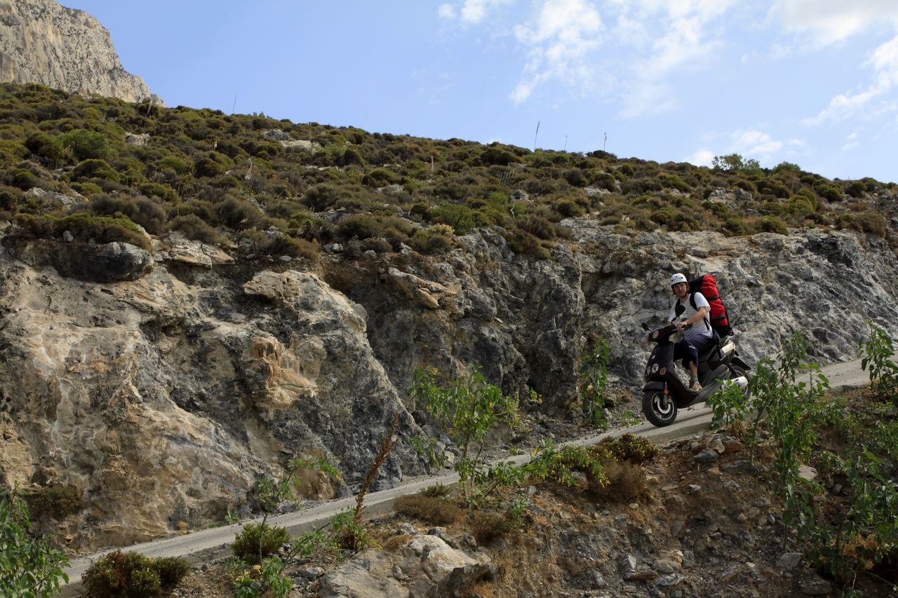 Greece - Brano riding a scooter in Kalymnos 01