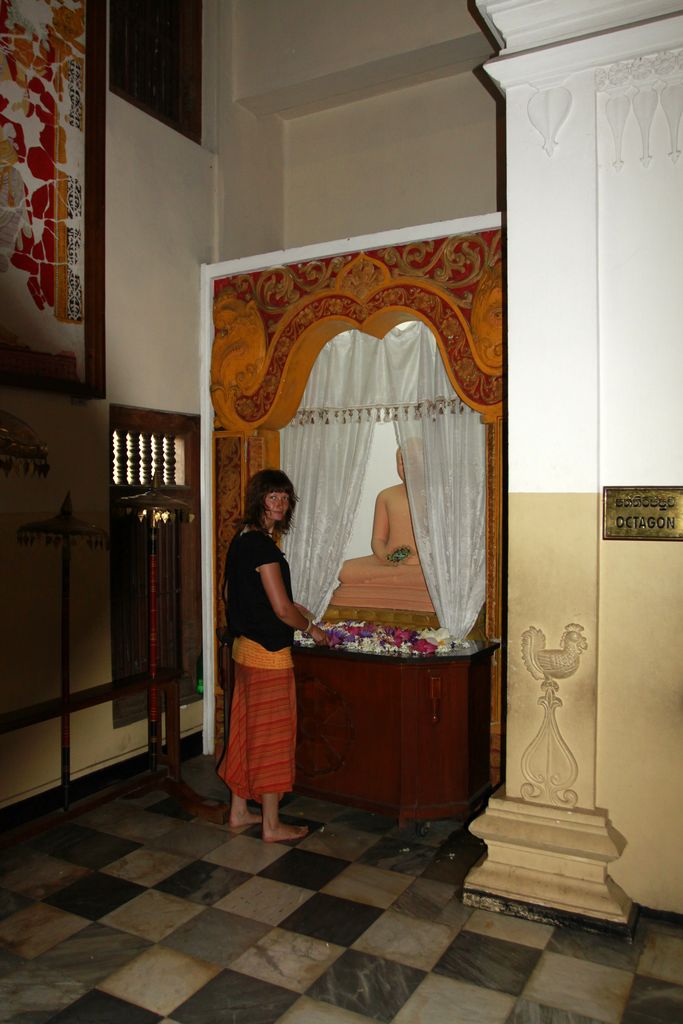 Sri Lanka - Paula offering lotus flower in the Temple of the Tooth Relic