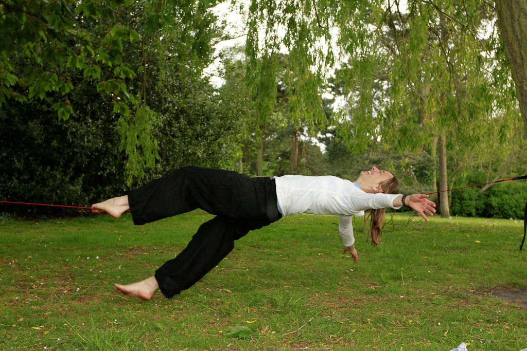 England - Karin slacklining in a park in Harrogate