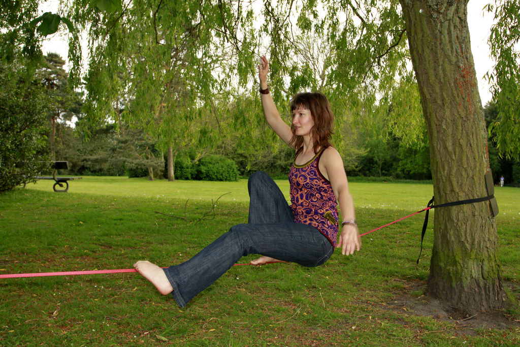 England - Paula slacklining in a park in Harrogate