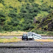 Drawing the bus from the river